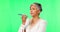 Woman, speaker phone call and talk by green screen, studio background or serious conversation in mockup. Mature indian