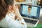 Woman speaking with doctor in house in sunny day