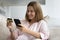 Woman spend money on internet use credit card and smartphone