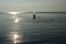 Woman Splashing in the Lake in Sunset