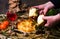 Woman splitting Orthodox Christmas eve bread