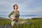 Woman in sport clothes enjoying harmony during workout