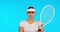 Woman, sports and portrait of tennis player in studio for wellness, training or competition on blue background. Female