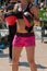 Woman in Sportswear doing Fitness with Punching Mitts in Outdoor