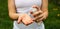 A woman sprays antiseptic on her hands - taking care of health, cleanliness, protection from dangerous bacteria and viruses.