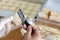 Woman spreading butter on a small piece of bread to make biscuits. Social media food trends, Homemade biscuits