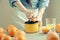 Woman squeezing oranges for juice