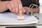 Woman is stamping a document with a stamp