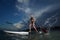 Woman stand up paddle boarding