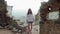 Woman standing on ancient ruins