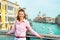 Woman standing on bridge in venice, italy