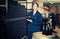 Woman standing with cardboard on small winery