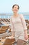 Woman standing on deck of cruise ship