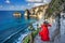 Woman standing on Diamond beach in Nusa penida island, Bali in Indonesia.