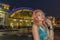 A woman standing in front of the  Hua Lamphong train station in Bangkok