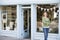 Woman standing in front of organic food store