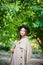 Woman standing near the lemon tree