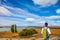 Woman is standing in the Patagonian pampas