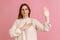 Woman standing with promise hand sign, gesturing palm up, giving promise, pledging allegiance