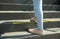 Woman standing on stairs with taped floor marking for social distance, closeup. Coronavirus pandemic