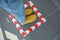 Woman standing on taped floor marking for social distance, closeup. Coronavirus pandemic