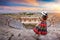 Woman standing on theater of Hierapolis ancient city in Pamukkale, Turkey.