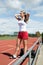 Woman Standing on a Track