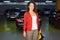 Woman standing in underground car parking