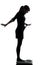 Woman standing on weight scale happy silhouette