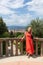 Woman stands against the backdrop of the panorama of Florence, Italy.