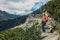 Woman stands on the cliff