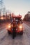 Woman stands front off 4x4 terrain vehicle.