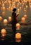 a woman stands in the water surrounded by lanterns