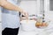 Woman stirring dough with spoon