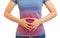 Woman with stomach ache keeps hands on belly