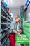 Woman in storeroom of key maker store