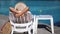 Woman in straw hat lying on deck chair near swimming pool. Shot on RED Raven 4k Cinema Camera