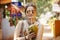 Woman on the street with coconut drink