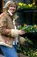 Woman on the street with flowers