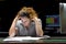 Woman in stress in front of computer