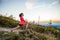 Woman stretching after trail cross country running