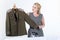 Woman stroking a military tunic