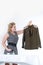 Woman stroking a military tunic