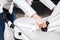 Woman strolling with baby-carriage. Close up of female hands adjust the canopy baby-carriage