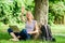 Woman student sit on grass while study. Nature essential wellbeing and ability be productive. Work in summer park. Girl