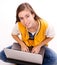 Woman student sitting with laptop