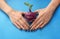 Woman with stylish manicure and turnip on color background