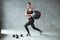 Woman In Stylish Sports Wear Training With Med Ball