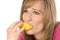 Woman sucking on a lemon