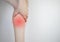 A woman suffers from pain in the calves. Stretching the calf muscle, varicose veins, leg cramps, or myositis. Orthopedic doctor